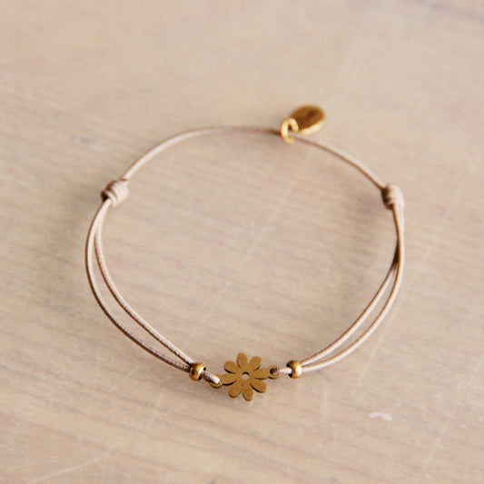 Elastisches Armband mit Gänseblümchen – Taupe/Gold