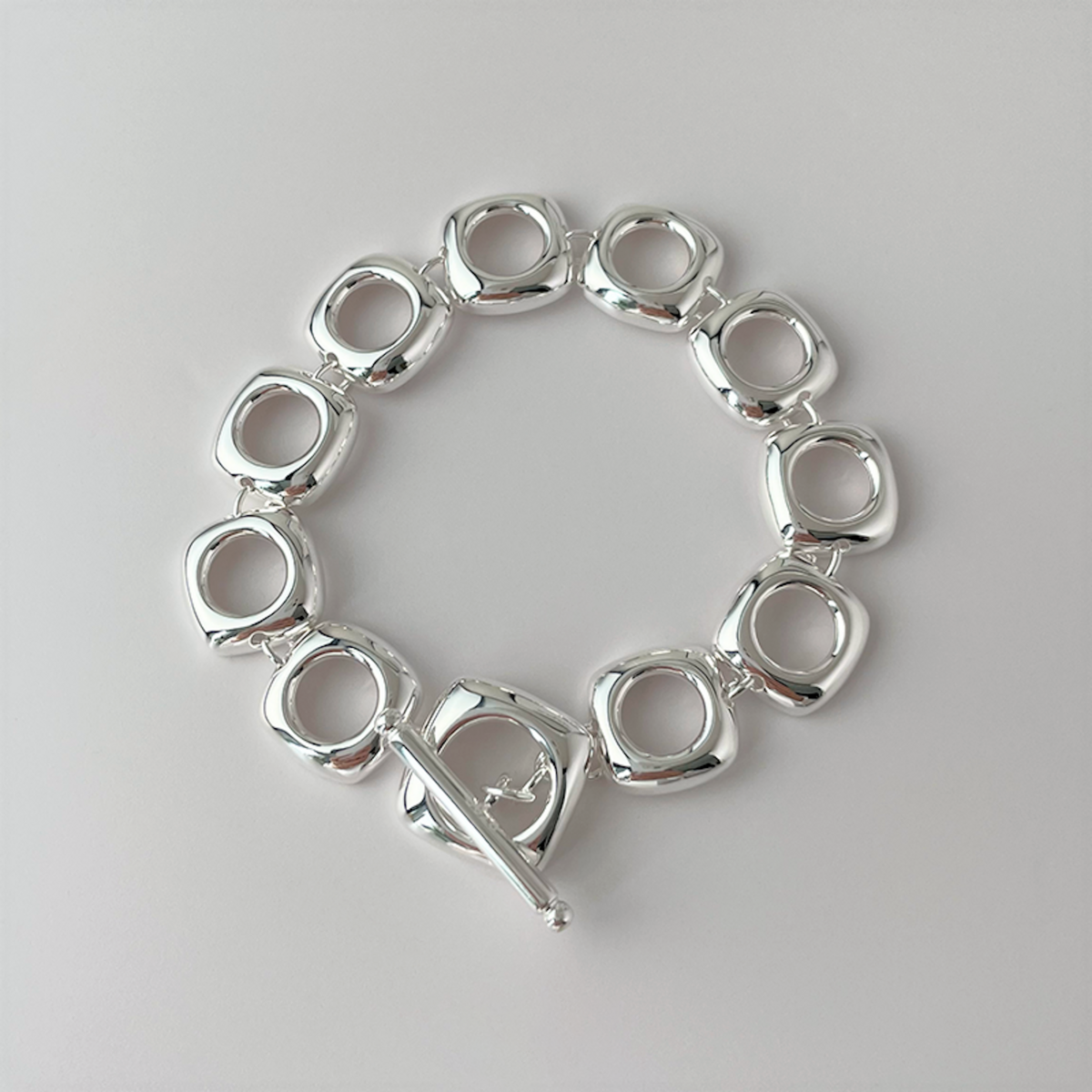 Klobiges Gliederarmband aus Sterlingsilber mit quadratischem Rahmen und OT-Schnalle