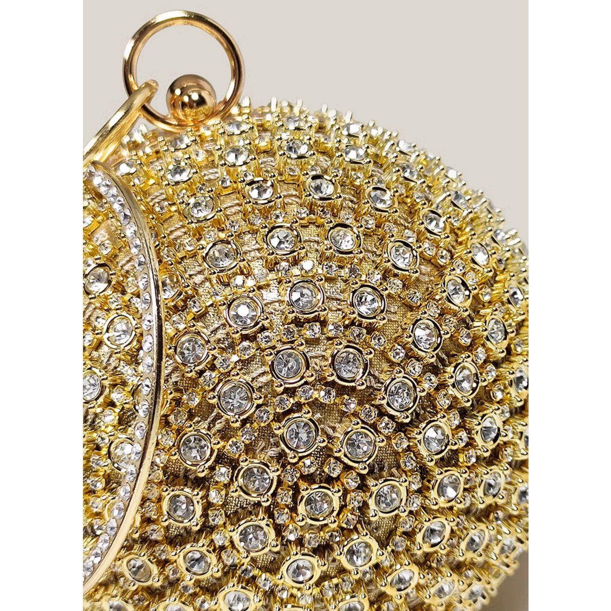 Ausgefallene, schillernde Goldkugel-Clutch im Diamant-Look