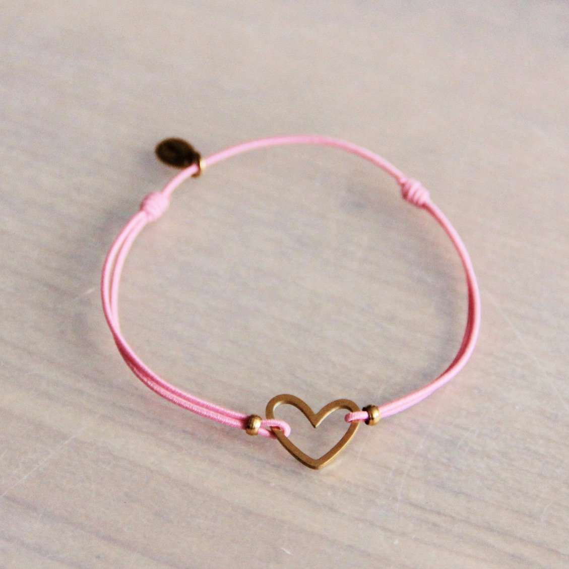 Elastisches Armband mit offenem Herz – rosa/gold