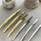 Einreihige, minimalistische Haarspange aus Metall in Gold und Silber