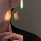 Einzigartige Design-Ohrringe mit dynamischen Quasten – Gold und Silber