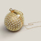 Ausgefallene, schillernde Goldkugel-Clutch im Diamant-Look